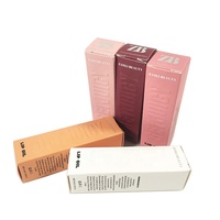 Boîtes en papier longues personnalisées avec logo imprimé, impression artistique en relief et finition mate lisse pour l'emballage cosmétique d'huile à lèvres OEM ODM