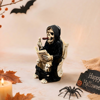 Vente directe usine : Figurine en résine amusante de squelette Grim Reaper assis sur les toilettes en lisant un journal – Statue de squelette