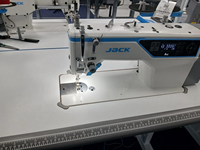 Machine à coudre industrielle Jack A4C-C à aiguille simple, entraînement direct, entièrement automatique, avec système de verrouillage, équipée d'un plan de travail et de pieds