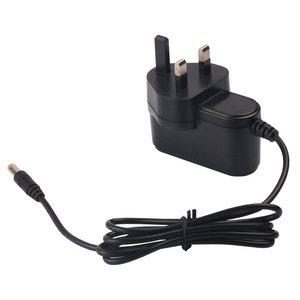 <b>Switching</b> Power Adapter 12V 1.5A DC Output British <b>Plug</b> For Electronics - Product Image 1