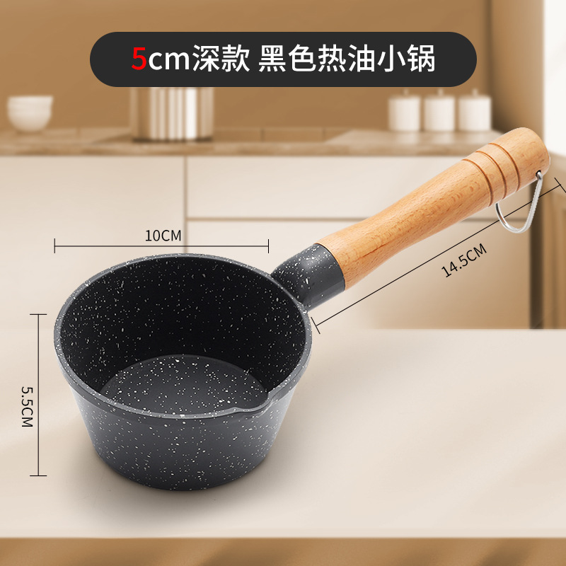 Pouring oil into a wok [Black]