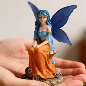 Escultura de Resina de Hada de Fantasía Personalizada, Vestido Azul y Naranja, Chica Hada Pintada a Mano Sentada en una Base de <span class=keywords><strong>Roca</strong></span> con Flores Coloridas - Product Image 2