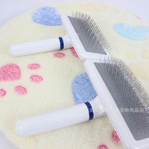 Peine para mascotas Jinwei de acero inoxidable con mango blanco para gatos y perros, herramienta de aseo con airbag para eliminar el pelo de perros pequeños. - Product Image 4