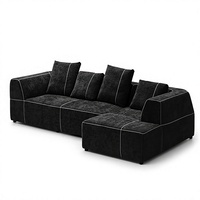 Canapé modulaire en forme de L, style moderne minimaliste, obsidienne noire et blanche, surpiqûres contrastées, pour grand appartement
