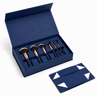 Boîte cadeau pliable magnétique en carton bleu avec insert en EVA personnalisé avec logo en relief de qualité supérieure pour pinceaux de maquillage