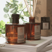 Diffuseur décoratif de luxe de roseau de bouteille en verre ambré de parfum d'huile essentielle d'aromathérapie avec des boîtes d'emballage