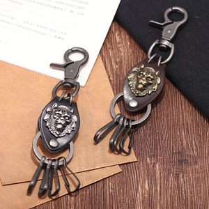 Llavero de cuero con cabeza de león tallada en metal, forma ovalada, color plata antigua y bronce, para colgante de coche. - Product Image 2