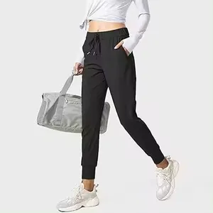 Logo personnalisé vente en gros Respirant Fitness femmes Joggers avec poches pantalon de salon pour Yoga entraînement course pantalons de survêtement pour les femmes