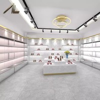 Nakashima personnalisé élégant vitrine en verre pour cosmétiques chaussures lumière LED pour bureau Studio magasin de chaussures support accessoire affichage