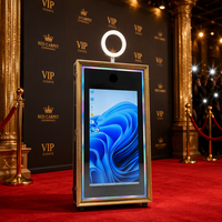 Photomaton intégré dans un cabinet, style borne interactive, avec éclairage RGB et imprimante dissimulée, idéal pour les événements commerciaux