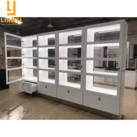 Vitrine de magasin mobile en verre de haute qualité avec éclairage LED Accessoires de téléphone portable de qualité supérieure Conception de meubles