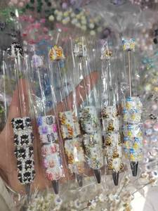 Stylos à perles DIY best-sellers transfrontaliers, stylos à bille robustes en argile souple, fournitures scolaires mignonnes - Product Image 1