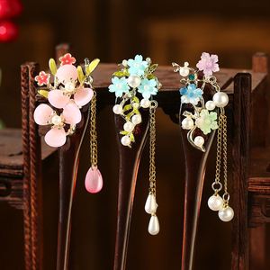 Palillo de pelo retro de madera de moda chino para mujer con borlas de flor de magnolia y cadena, horquilla de madera hecha a mano - Product Image 2