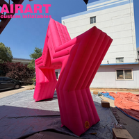 Arche gonflable étoile rose pour événements publicitaires et décorations. Arche gonflable étoile personnalisée pour événements en extérieur.
