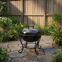 Barbecue rond noir élégant et moderne, en acier robuste, au charbon de bois et aux briquettes, pour le camping en plein air, le jardin et la cour.