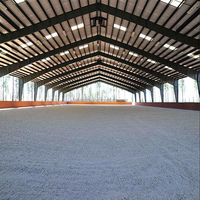 Bâtiment métallique à grande portée pour séchage et stockage de cacao — Toiture à forte pente, bardage ventilé