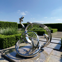 Sculpture de dauphin sautant en acier inoxydable poli, résistante aux intempéries, statue réfléchissante sur le thème de l'océan, décoration de jardin, bord de mer, parc, hôtel
