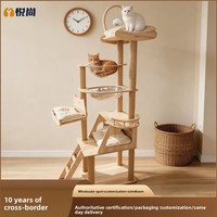 Arbre à chat avec lit intégré et poteaux à gratter, grand structure d'escalade peu encombrante