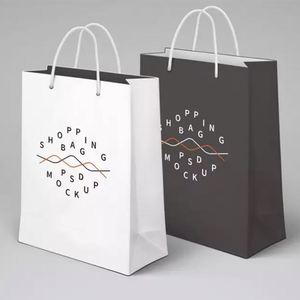 Custom Eco-Friendly Clothing Shopping Carry Bag Cardboard Shopping Boutique <b>Gift</b> <b>Cheap</b> Paper Bag with the Eyelet Punching Handle - Product Image 2