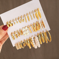 Nouvel ensemble de boucles d'oreilles créoles tendance en alliage, perles et papillons en acrylique pour femmes, bijoux creux en alliage de zinc