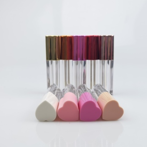 Vente en gros Paquet en forme de cœur Brillant à lèvres Rouge à lèvres Tube correcteur Cosmétique Vide en plastique Rose Couvercle Bouteille transparente - Product Image 1