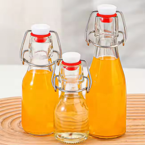 Botellas de vidrio ámbar transparente con tapa abatible a prueba de fugas de 500 ml y 16 oz con tapón para bebidas aceite vinagre Kombucha almacenamiento de agua - Product Image 3