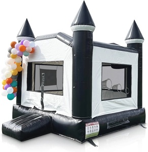 Château gonflable commercial en PVC noir et blanc avec toboggan, idéal pour la location événementielle - Product Image 2