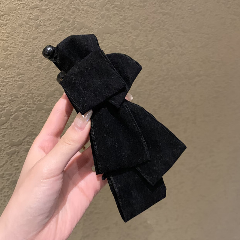 Black suede banana clip