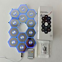 Lampe murale d'ambiance RGB créative à LED, design hexagonal, style nid d'abeille, lumière quantique, design moderne, télécommande, application