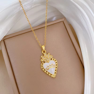 Collar con colgante de corazón chapado en oro de 18 quilates a la moda, patrón cruzado de acero inoxidable, hermoso regalo para él/ella