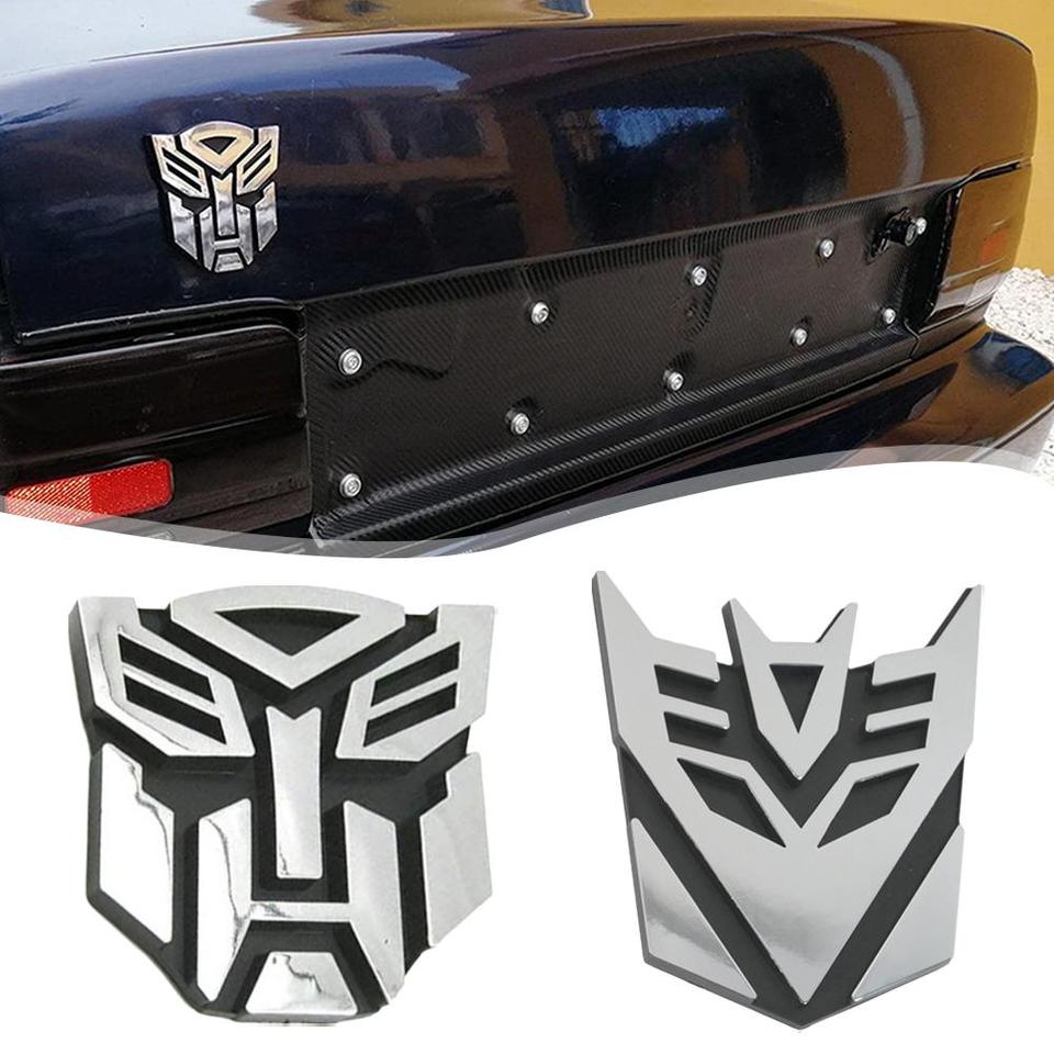 Transformer Autobot Gold Finish Auto Emblem - 3 Tall Metal EMBLEMA TRANSFORMERS 3D AUTOBOT O DECEPTICON - Car Emblems & License Transformer Autobot Gold Finish Auto Emblem - 3 Tall White - Foto 2