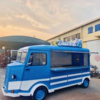 Camion de nourriture mobile de style français rétro classique, chariot à café, hot-dogs et glaces pour la vente de nourriture de rue en extérieur