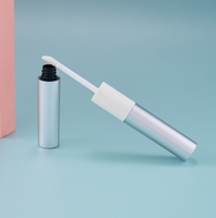 Kustom kualitas baik tabung Pewarna Bibir kemasan botol lapisan bibir 2 in 1 tabung Lip Gloss