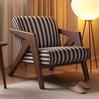 Fauteuil de salon moderne de luxe nordique en bois massif, confortable et élégant, avec design décoratif capitonné pour salon et chambre à coucher