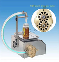 Machine de remplissage pour huiles alimentaires, pâtes de miel, eau potable, jus, gel, savon pour les mains, crème, gel de miel, pâte de sésame, colle