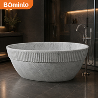 Baignoire autoportante circulaire en marbre blanc de qualité supérieure, à rebord cannelé, sculptée à la main, veinée de gris, pour hôtel, spa, villa