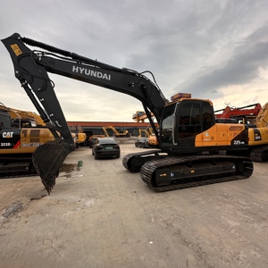 Excavatrice Hyundai Robex 225-9s d'occasion, engin de chantier lourd, couleur orange et noir, 25000 kg, 0-2000 heures, avec rapport. - Product Image 5