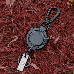 Cuerda de acero de 1.0 mm con mosquetón, triangular, negra, con hebilla antirrobo telescópica, carrete resistente de fácil extracción. - Product Image 1