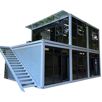 Maisons en conteneur à paquet plat avec maison en verre Bâtiments portables Maison modulaire Conteneurs d'expédition modernes Maisons en conteneur