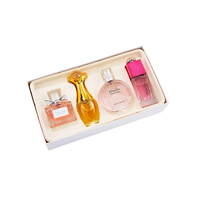 Boîte d'emballage cadeau en carton écologique de luxe à conception de logo personnalisé boîte magnétique d'emballage cadeau de parfum de qualité supérieure huile essentielle