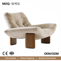Fauteuil bouclé de luxe avec pieds en chêne, chaise longue de haute qualité pour salon, maison, hôtel