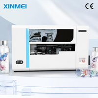 Imprimante UV industrielle rotative à 360 degrés Xinmei pour bouteilles, gobelets et cylindres, avec vernis blanc