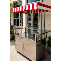 Comptoir de restauration rapide commercial portable en acier inoxydable avec auvent rouge et blanc et roues