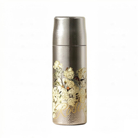 Bouteille isotherme de voyage de luxe 700 ml en titane pur, avec infuseur à thé, maintien au froid 24h et au chaud 12h, motif floral martelé, support OEM/ODM complet, personnalisation du logo