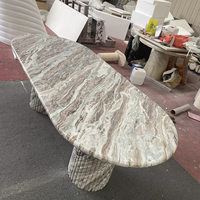 Table à manger ovale en marbre naturel de luxe moderne avec piétement cannelé pour villa, salon, hôtel
