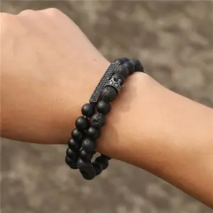 Großhandel Premium schwarz gefrostet Lava-Stein gemischte Krone langer Stretch-Armband für Herren