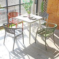 Mobilier moderne et unique de salle à manger en rotin pour café en plein air hôtel restaurant Mobilier de jardin en plein air Ensemble table chaises