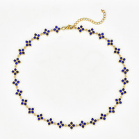 Collier ras-de-cou sportif en acier inoxydable plaqué or 18 carats avec trèfle à quatre feuilles et chaîne en bambou