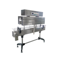 Machine de rétraction d'étiquettes pour col de bouteille, pour l'emballage de bouteilles en plastique et en verre