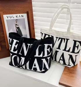 Bolso de lona de algodón de moda, muy vendido, con correa larga para el hombro y diseño ecológico simple. - Product Image 1